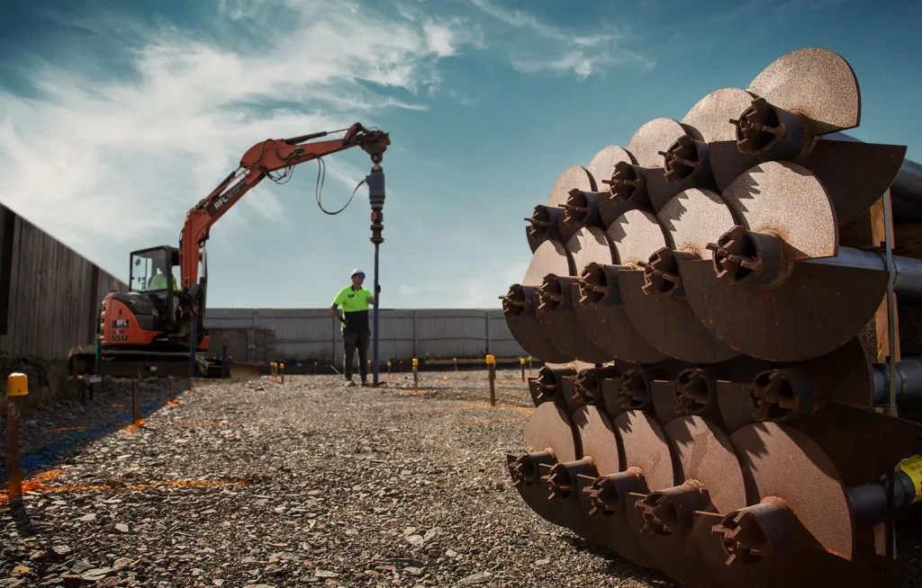 Torquing a screwpile into the ground